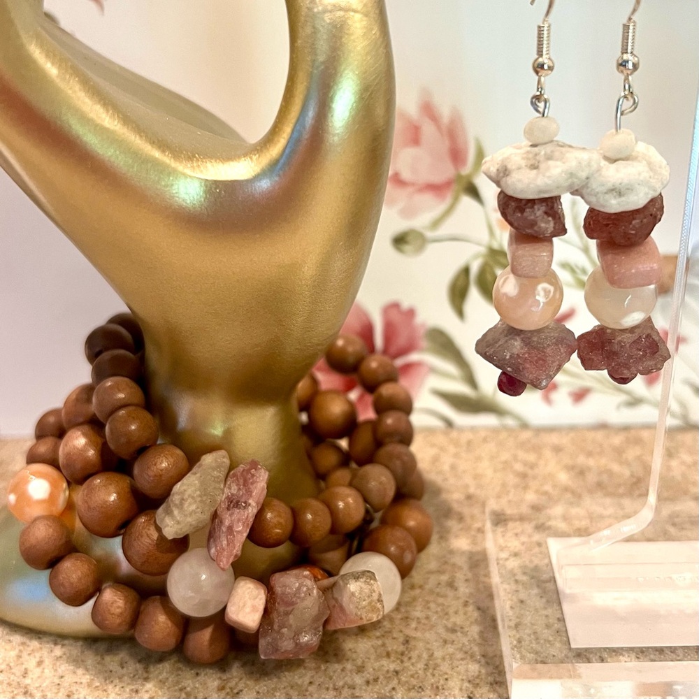 3 wooden beaded stretch bracelets with matching earrings.